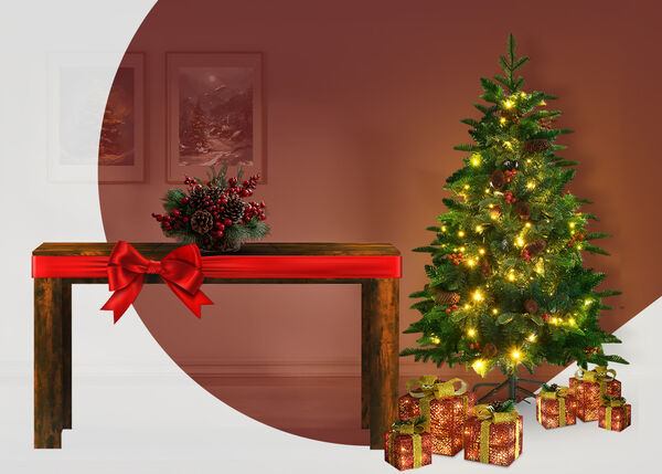 Soe, stiliseeritud p&uuml;hade stseen kitsast tumedast puidust lauast, mis on seotud laia punase lindiga ja suure lipsuga. Laual on dekoratiivne keskseade m&auml;nniokste ja punaste marjadega. Paremal s&auml;rab j&otilde;ulupuu sooja kollase valgusega ning selle all on laiali mitu kuldses s&auml;ras pakitud kingitust. Taust on pehme, soe pruun, osaliselt &uuml;mbritsetud suure kaarduva valge alaga vasakul, mis raamib kahte maastikumaali.