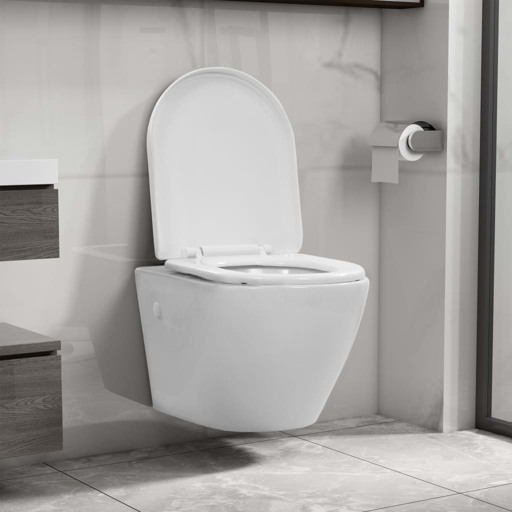vidaXL seinale kinnitatav ääreta keraamiline tualettpott, valge