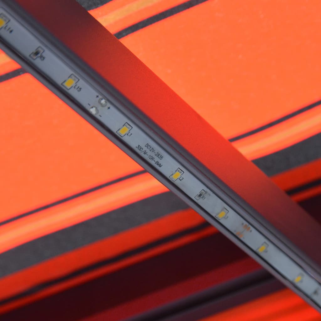 vidaXL käsitsi sissetõmmatav varikatus, LED 450x300 cm, oranž ja pruun